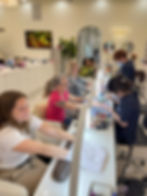 Clients receiving manicures at a Nail Salon Baton Rouge