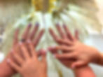 Manicured hands with pastel nails