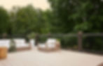 Outdoor TimberTech composite deck with lounge chairs and seating area