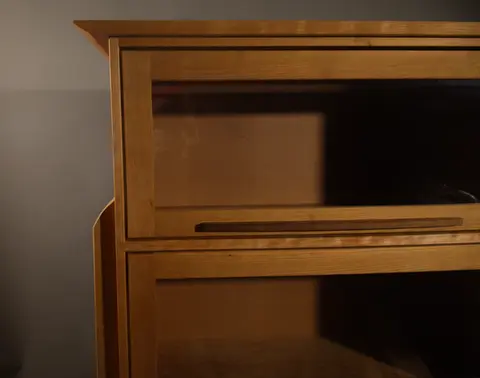 Close up of the top section of a barrister bookcase