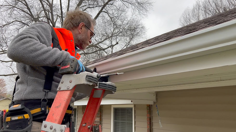 Legacy Gutters NWA Owner (Scott) doing an install