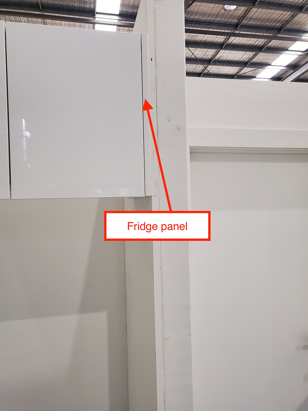 Fridge cabinet side panel – gloss white flat pack kitchen joinery panel from Kora Kitchens Brisbane