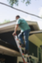 Inspector Climbing Ladder