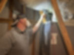 inspector checking attic components