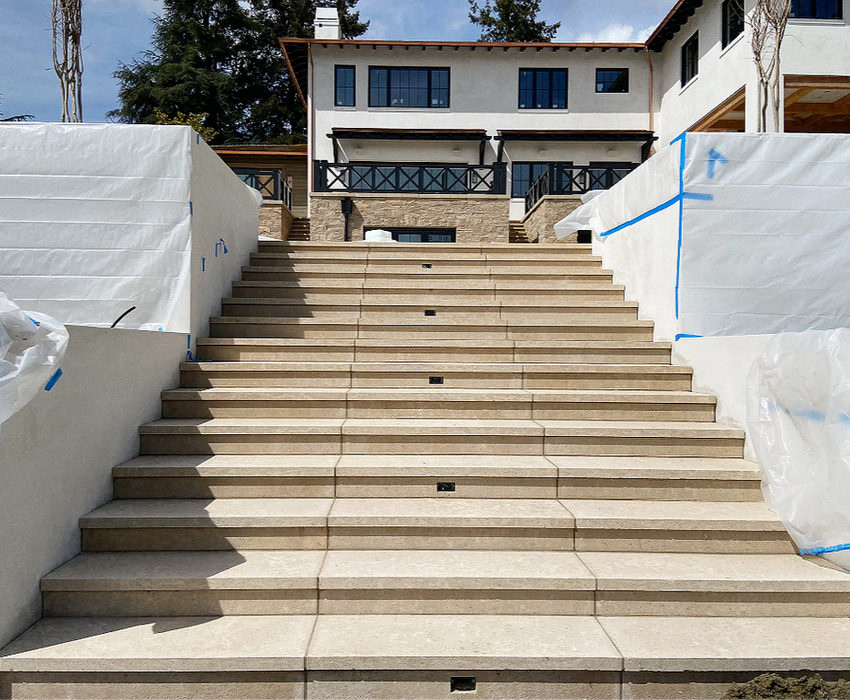 Coffee Limestone big format stairs with acid wash finishes_edited.png