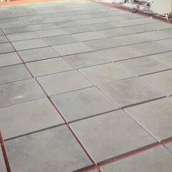 Comprehensive outdoor dry-lay grid layout of large rectangular Barbotine Limestone floor tiles.
