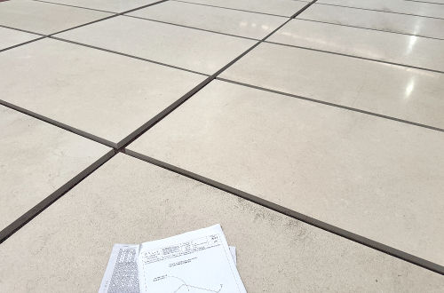 large-format honed limestone pavers to show natural color range variation.