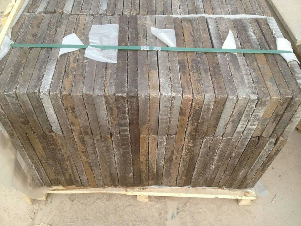 Finished Montipora Limestone slabs palletized and ready for export, illustrating professional workshop packaging and high-standard quality control.