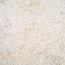 Smooth honed Sunny Beige Limestone showing soft golden tones and a bright, cohesive surface.