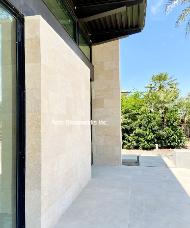 Modern architectural volumes at the Palm Spring Residence highlighting the contrast between Coffee and Khaki Limestone.