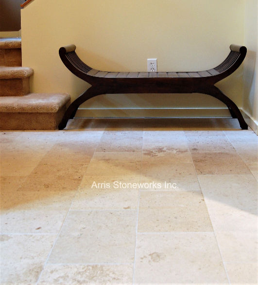 Interior flooring featuring Rattan Limestone with a honed finish by Arris Stoneworks