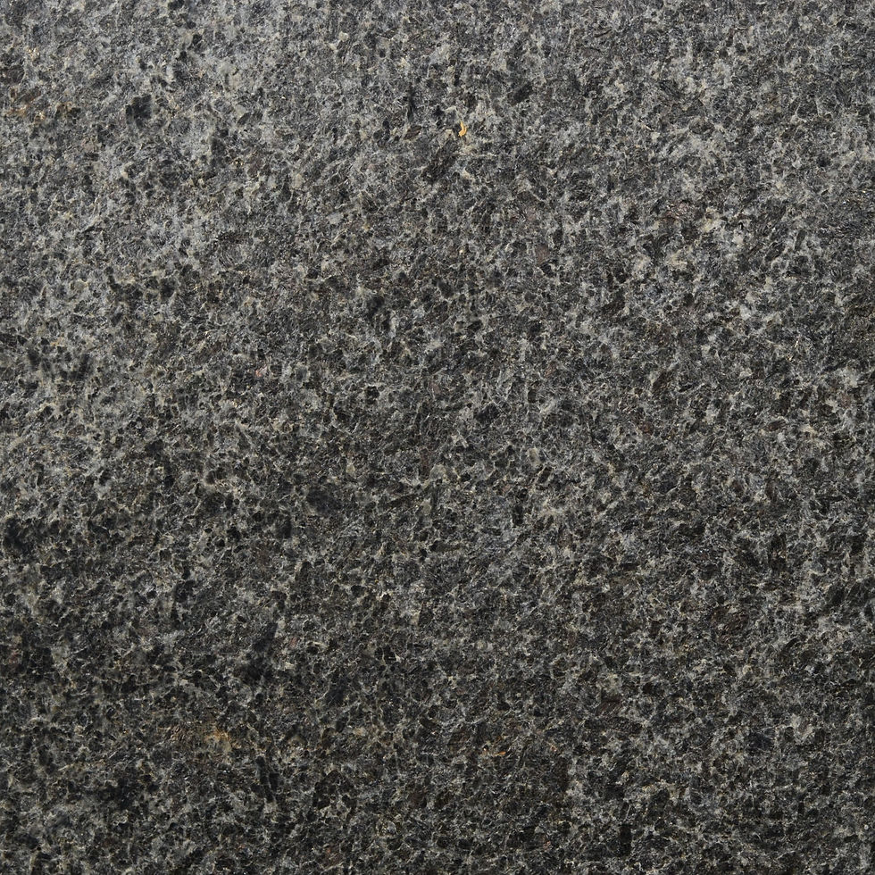 Flamed Black Galaxy Granite featuring a rugged, slip-resistant exterior texture that reveals the stone's natural mineral depth and durable crystalline structure.