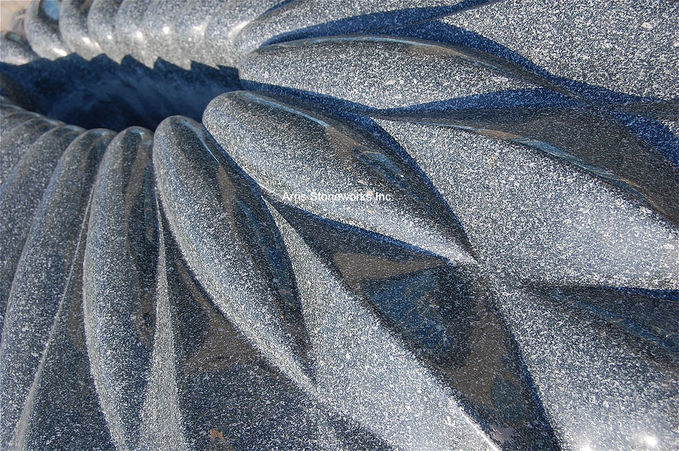 Custom Stone Sculpture Sea Granite with Unique finish for Moffett Towers by Arris Stoneworks