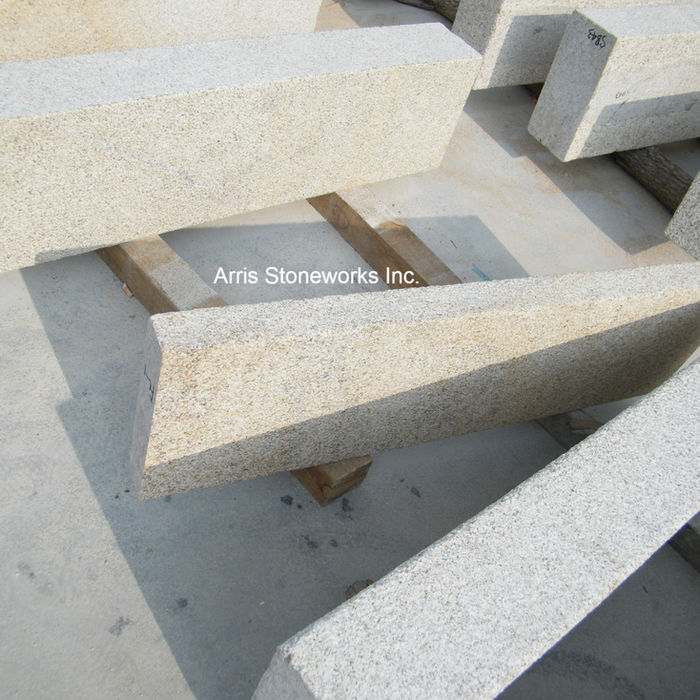 Precision-cut Gold Beige Granite threshold with a refined honed surface, emphasizing the stone's sophisticated blend of gold, beige, and blue-grey tones.