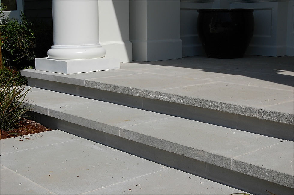 Luxury pool surround and tiered stairs featuring White Sandstone pavers with a slip-resistant sandblasted finish at the Windemere Residence.