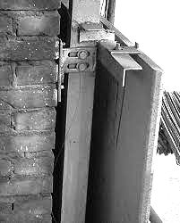 Specialized stainless steel mechanical anchoring systems and hardware installed on fabricated natural stone components for structural support.
