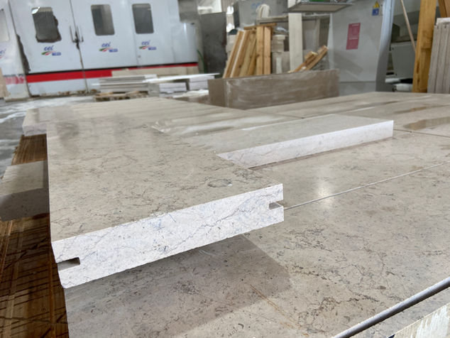 Precision-cut thick Pewter Limestone coping with a sand-scoured finish, ideal for high-end pool surrounds or stair treads.