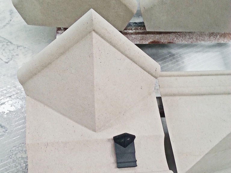 Close-up of custom-milled 3D stone profile with unique texture.