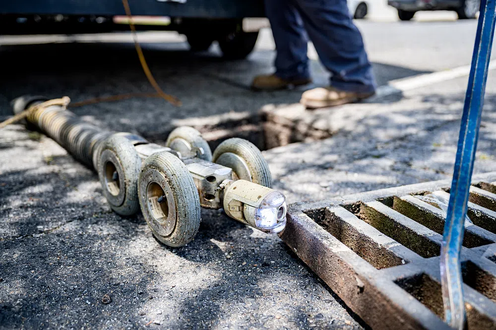 A blockage being inspected and cleaned