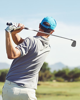 Golfer Swinging Club