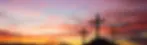 three crosses on a hill during sunrise