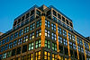 Modern building with glowing windows at night