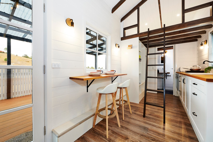 ladder leading to loft and out door