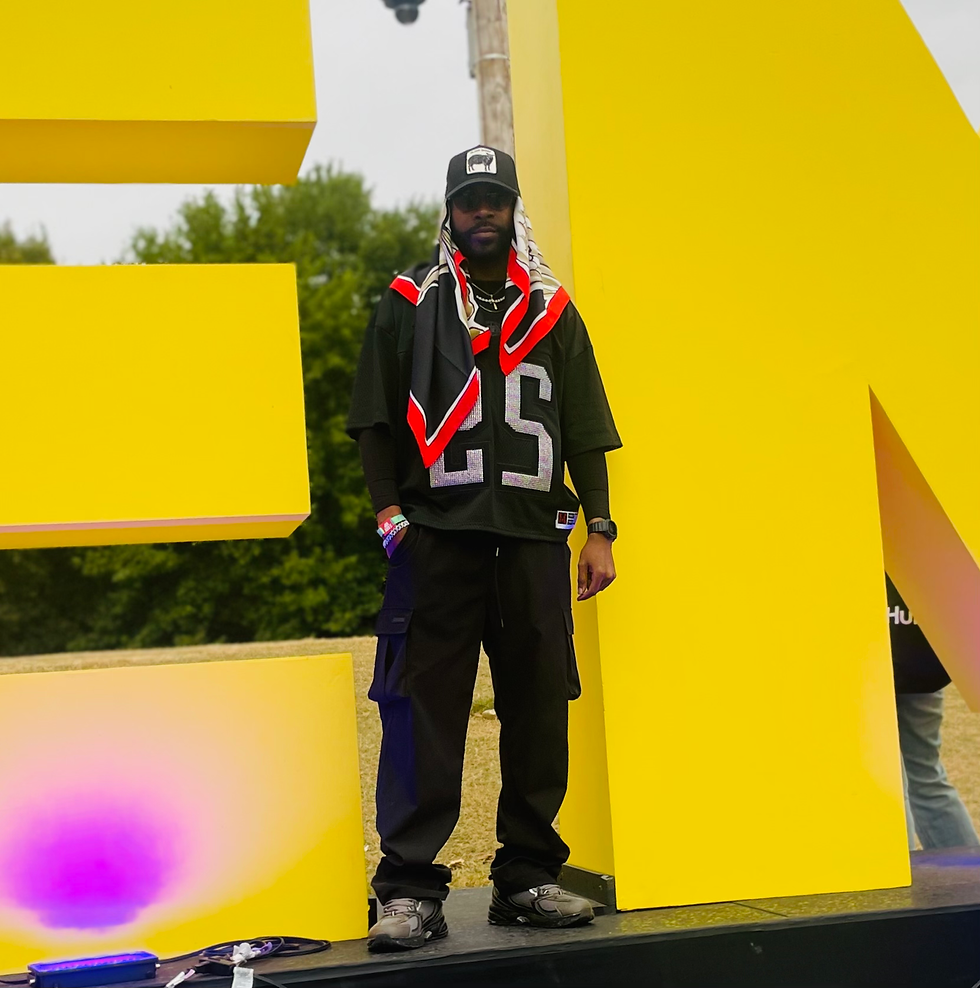@iam_mrlowery at the OMF sign