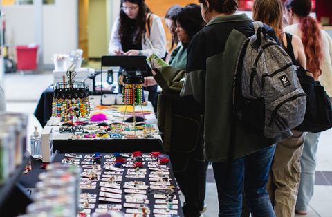 Indigenous Markets marketplace featuring Indigenous artisans at a conference event.
