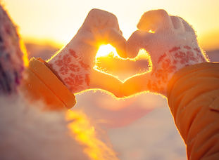 Michigan Acupuncture | Hands in gloves making a heart