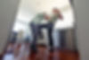 Woman victim using a self defense technique against attacker with knee strike readyher.