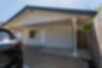 Carport and entrance to a building project