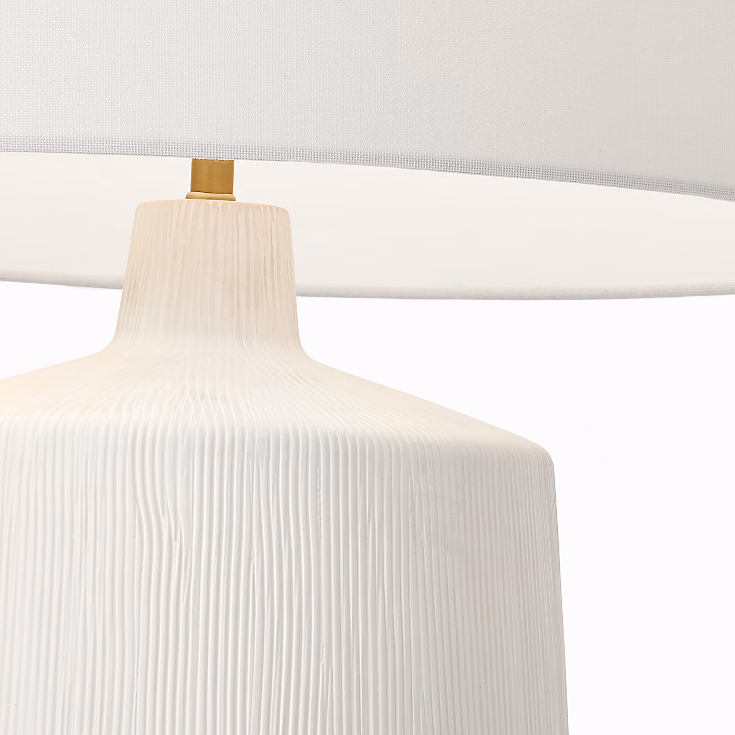 Matte white ceramic base and white linen shade
