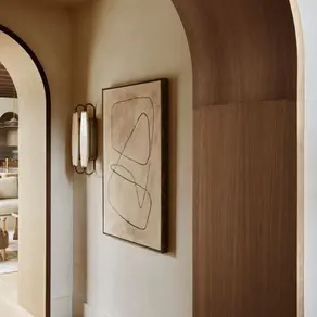 Art work and light in a calm, collected California entryway