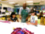 Dwayne_Teaching_Art_WolfHat_edited.jpg