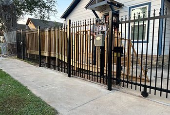Wrought iron fence installation in a Houston home
