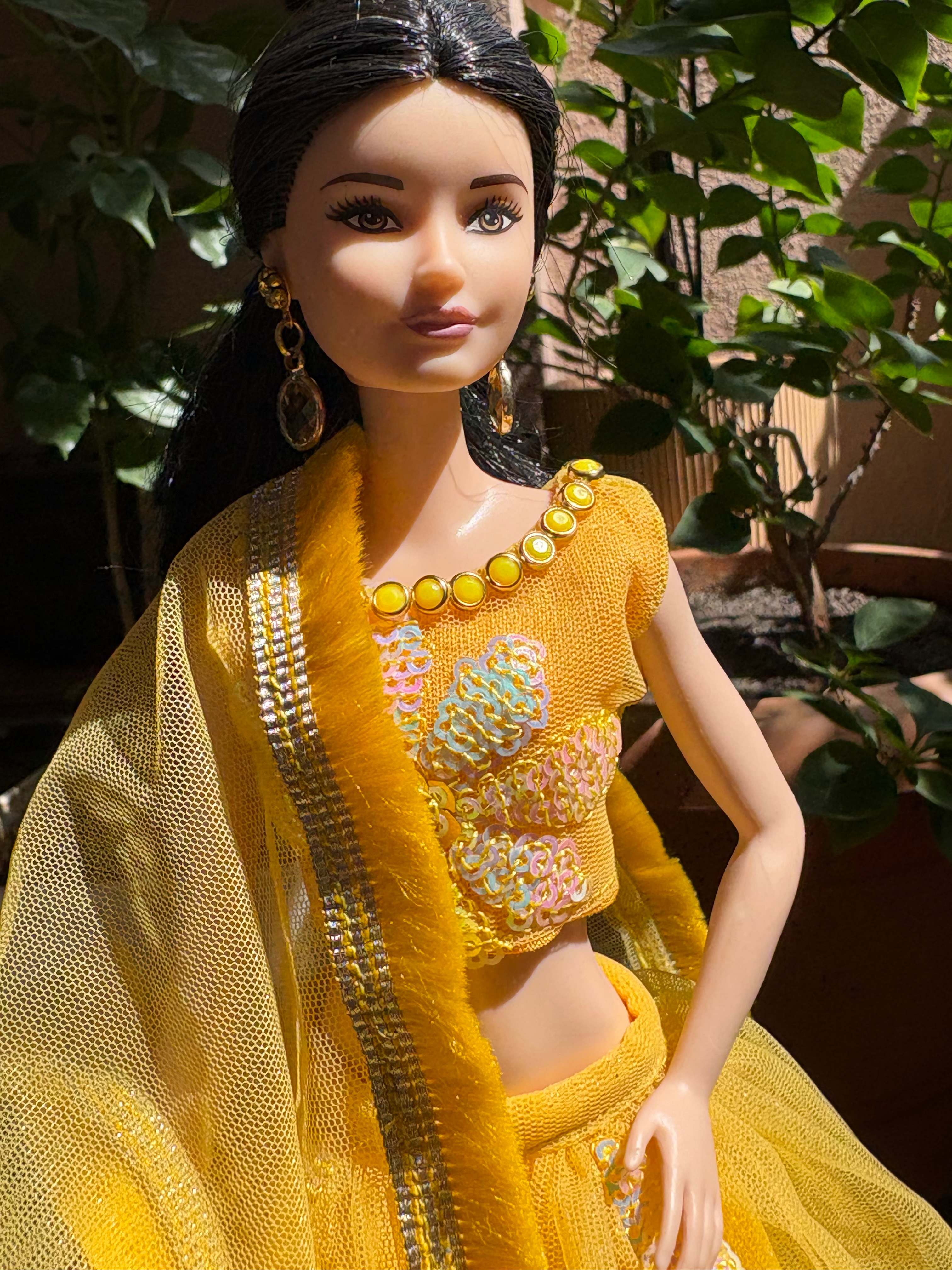Bright Yellow Sequin Lehenga with Jewelry.
