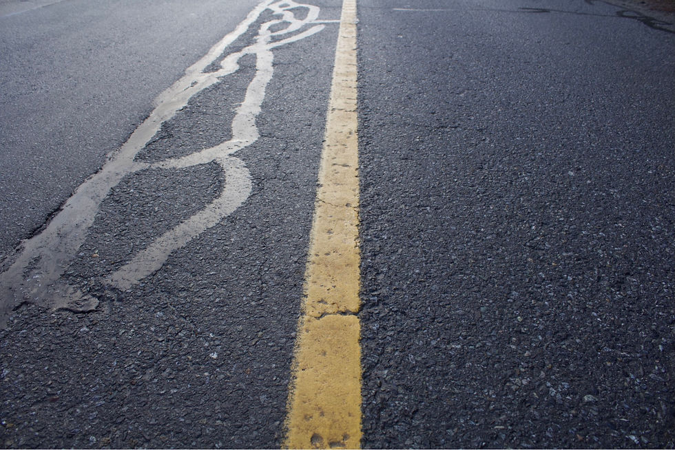 Line and Emphasis, using strong leading lines in the center of the road, them being bright and yellow with the dark grey background really pops.