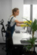 full-shot-woman-cleaning-indoors.jpg