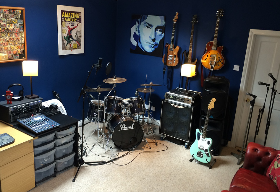 Live room drum kit and guitars