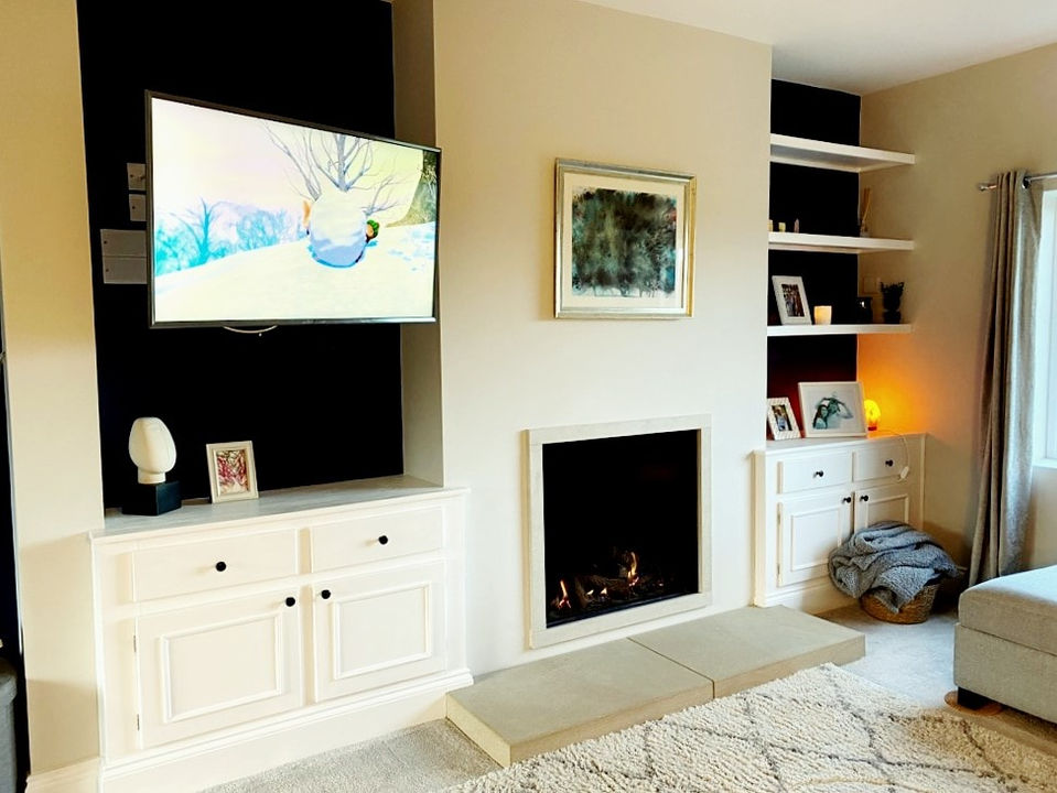 Painted bespoke fitted alcove units and floating shelves installed in Halifax
