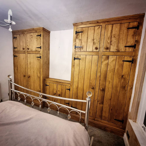 Pair of Pine plank door double wardrobes floor to ceiling near Hull