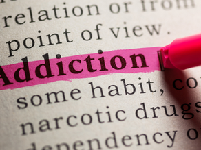 Addiction word marked in a book