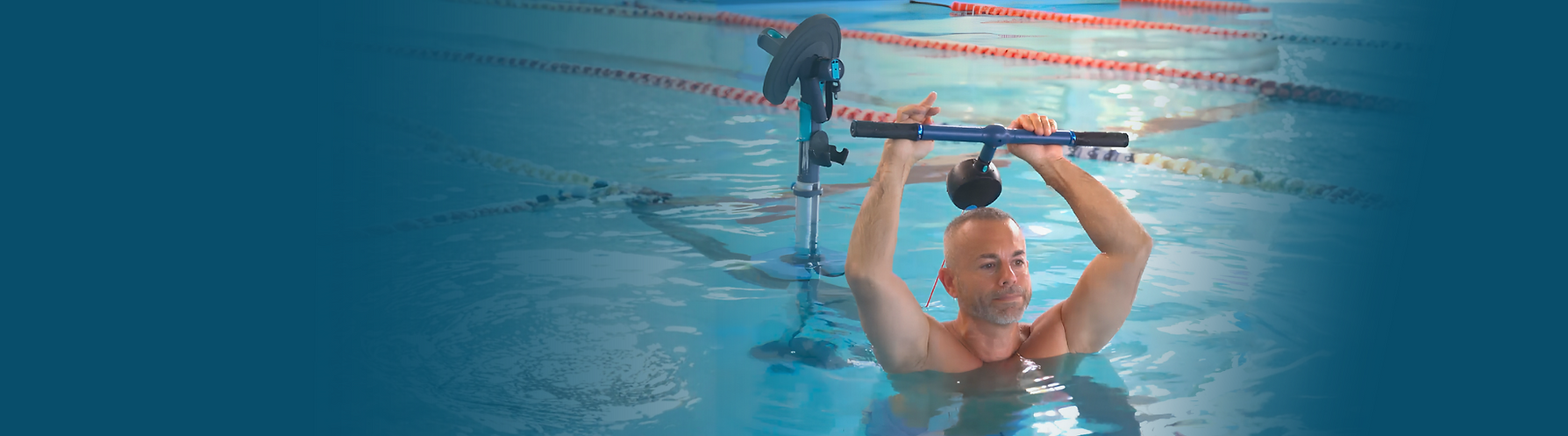 Man exercising with aquatic fitness equipment in a pool