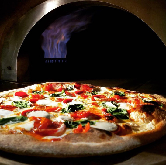 Tin Barn Brewing's Pizza Fresh Out of the Hot Pizza Oven with Delicious Pizza Toppings