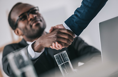 african-american-businessmen-shaking-han