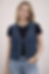Woman wearing Denim Pointed Vest with Demin Strip Accent Vertically Across Left Side