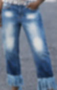 Man wearing faded denim jeans