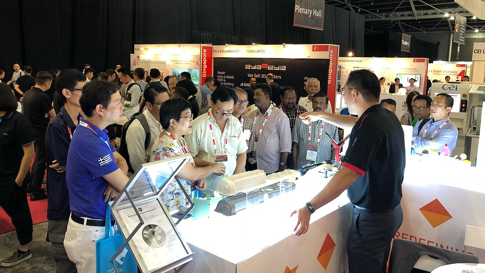 Representatives from the Shipbuilding & Marine Engineering Employees' Union (SMEEU) learning about 3D printing solutions at our booth.