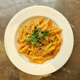 1. Cook the pasta in salted water until al dente.
2. Bring the cream to a boil. Stir in tomato purée and cheese; simmer for 1-2 minutes until the sauce becomes smooth and creamy.
3. Mix in the parsley and season with nutmeg, salt and pepper.
4. Combine immediately with the cooked pasta and seve.